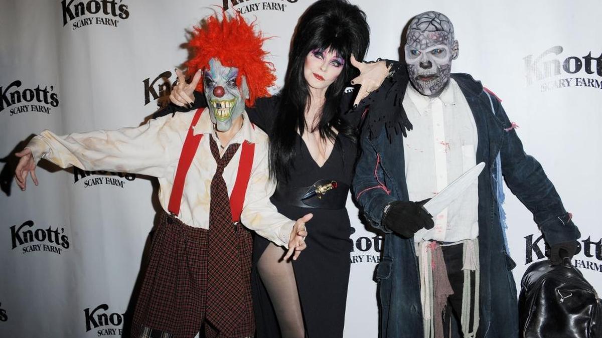 Elvira, center, attends the VIP Opening of Knotts Scary Farm HAUNT on Thursday, Oct. 3, 2013, in Buena Park.