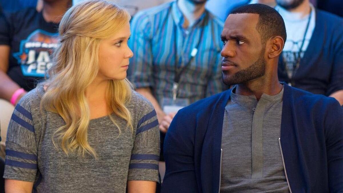Amy Schumer and LeBron James star in “Trainwreck”