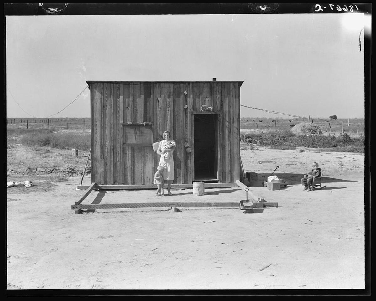 Do you know this family? Historian Joe Manning is searching for their identities. This photo was taken by Dorothea Lange in 1938 in Tulare County. The family, who was hard at work making improvements to their farm, built their shack on 20 acres they bought with a $50 down payment. At that time, the wife was 22 years old and had three small children, according to Lange’s notes. Her husband was 26.