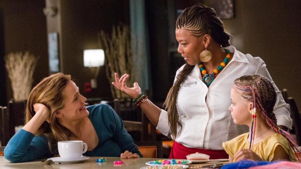 Jennifer Garner, left, Queen Latifah and Kylie Rogers star in “Miracles From Heaven.”