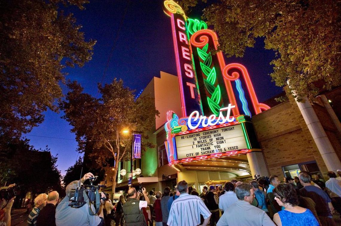The Crest Theatre’s new neon facade is lighted for the first time on K Street in downtown Sacramento on Monday, Sept. 21, 2009.