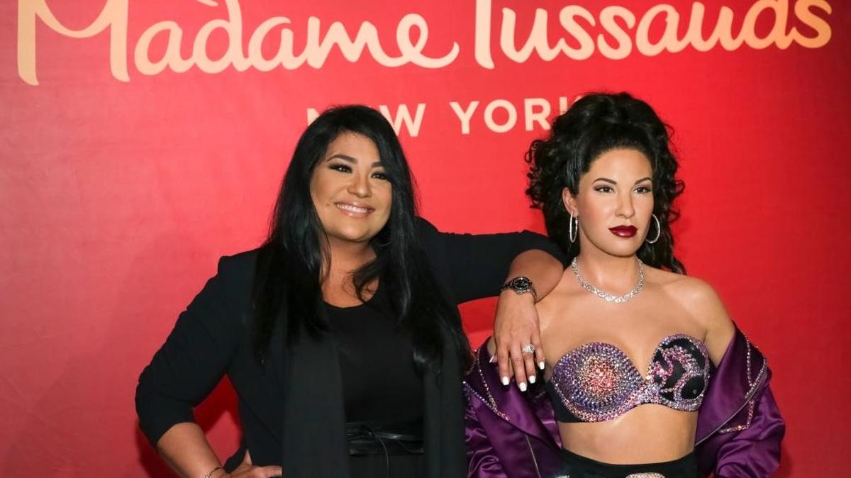 Suzette Quintanilla, left, poses with a wax figure of her sister, the late Tejano pop star Selena, during its unveiling at Madame Tussauds New York on June 23. Selena, who was killed in 1995, will receive a star on the Hollywood Walk of Fame on Nov. 3.