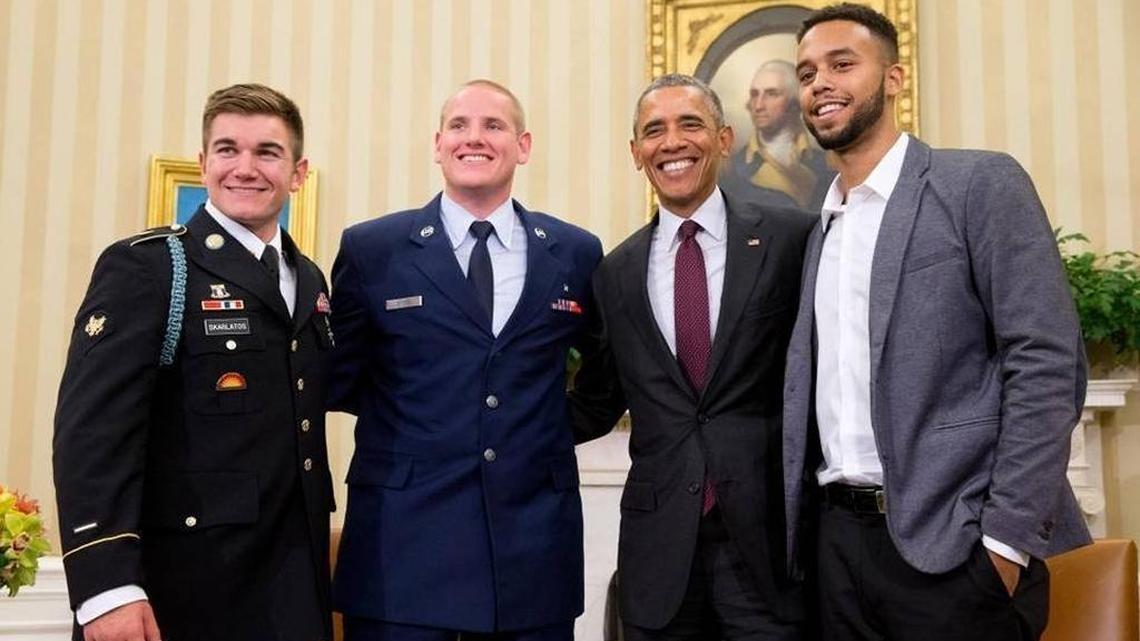 President Barack Obama poses with, from left, Alek Skarlatos, Spencer Stone and Anthony Sadler in the Oval Office of the White House on Sept. 17, 2015, to honor them for subduing a gunman on a Paris-bound passenger train in August.