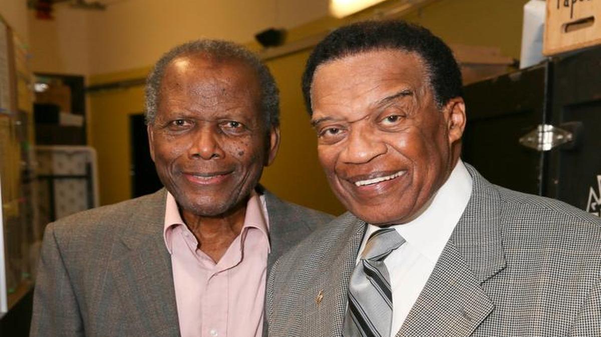 Actor Bernie Casey, right, is seen with actor Sidney Poitier in Los Angeles in 2014. Casey died Tuesday at the age of 78.