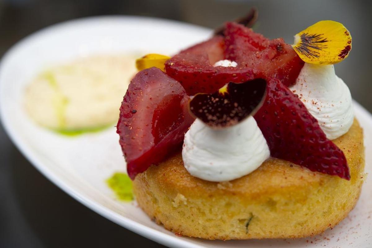 The East Sacramento restaurant’s olive-oil cake is topped with sliced strawberries.