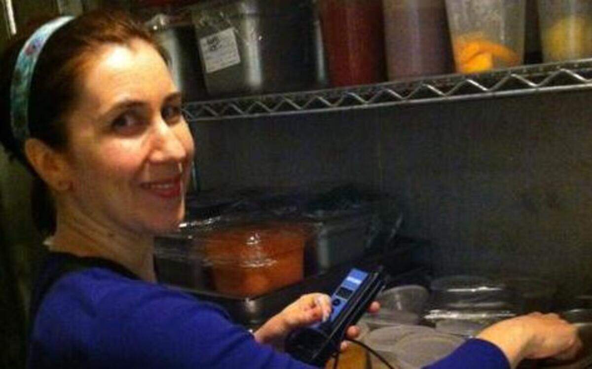 
Sara Cordozo takes food temperatures at Fabian’s.
