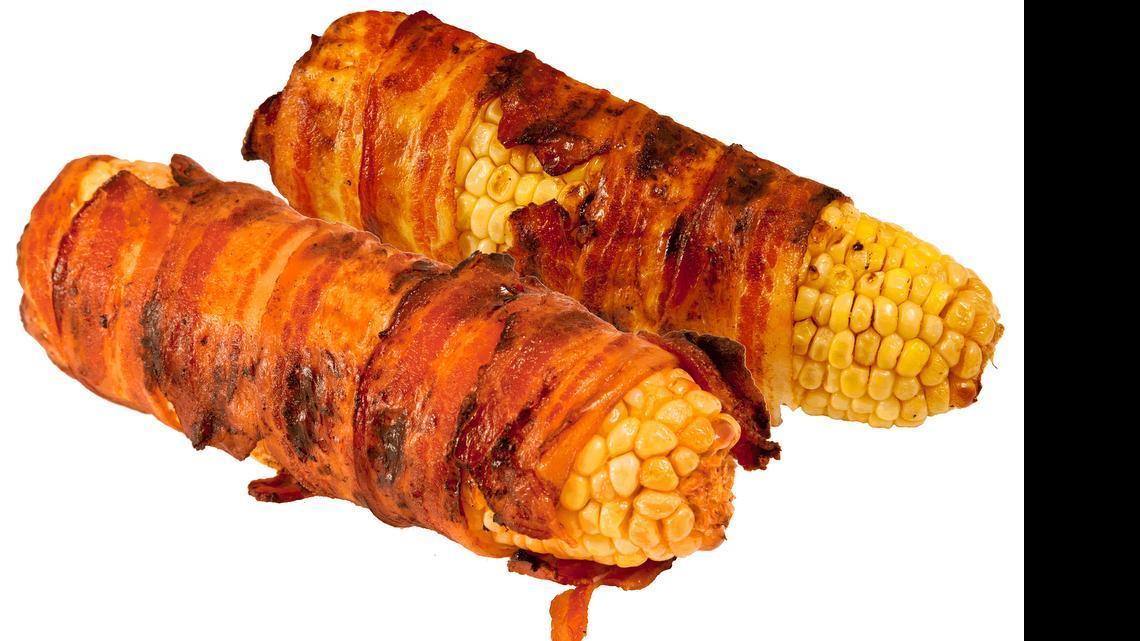 
Bacon-wrapped corn on the cob from Bacon Habit. 
