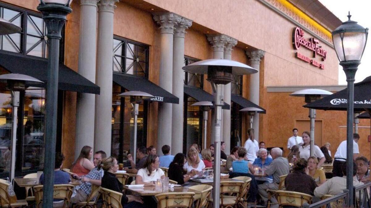 FILE - The outside patio of The Cheesecake Factory at 1771 Arden Way, Sacramento on Oct. 6, 2004