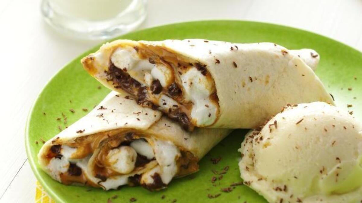 S’mores go undercover in grilled chocolate dessert wraps. This recipe is from Taste of Home.