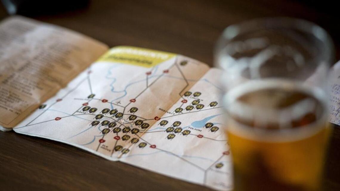 Beer enthusiast is first to visit all 52 area breweries listed in passport