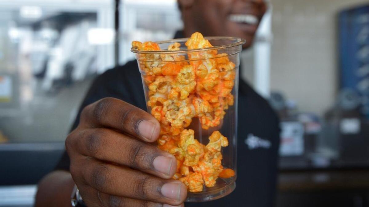 A sample of Cheetos Popcorn is shown at a theater in Euless, Texas, in August.