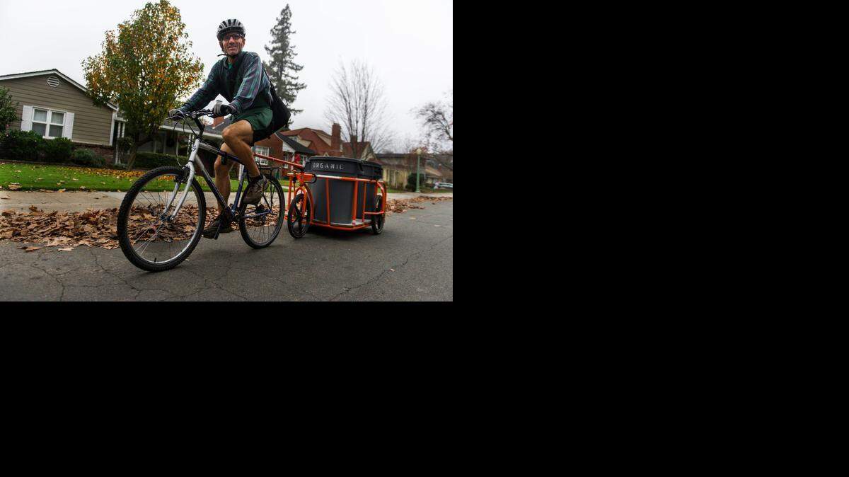 
Scott Thompson, program director for ReSoil Sacramento, transports scraps collected from Selland’s Market Cafe. Co-founder David Baker says ReSoil recently passed the 60,850-pound mark for its “pre-consumer waste” pickup.
