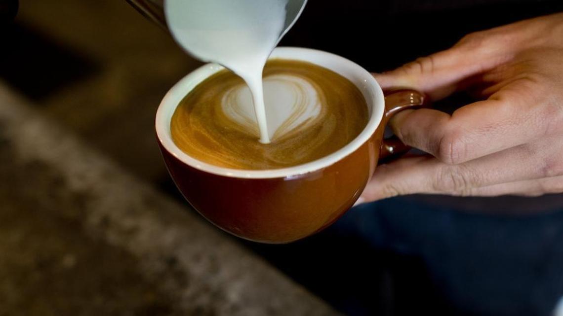 Insight Coffee Roasters Southside Cafe barista Darin Morgan concocts coffee drinks at the company’s cafe on Eighth Street in Sacramento on May 15, 2014.