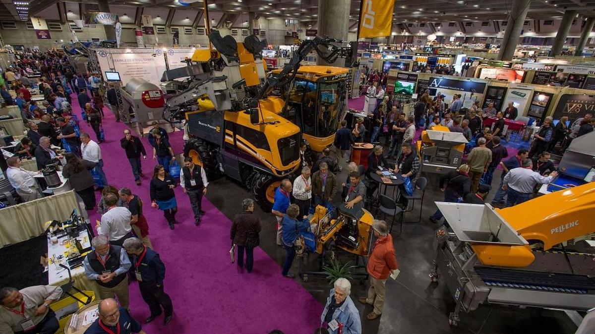 Hoards of visitors crowd the exhibit hall during the Unified Wine and Grape Symposium at the Sacramento Convention Center in Sacramento on Wednesday, Jan. 27, 2016.