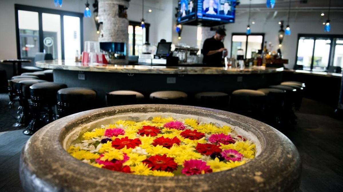 Fresh flowers floating in water at the entrance of the new Zocalo restaurant on Jan. 24, 2018. The grand opening for the restaurant is January 28, 2018.
