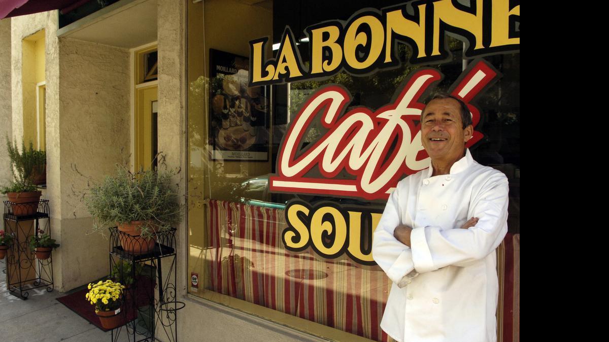 
Owner and chef Daniel Pont stands in front of his downtown cafe, La Bonne Soupe, in October 2005. Pont sold the cafe in 2011.
