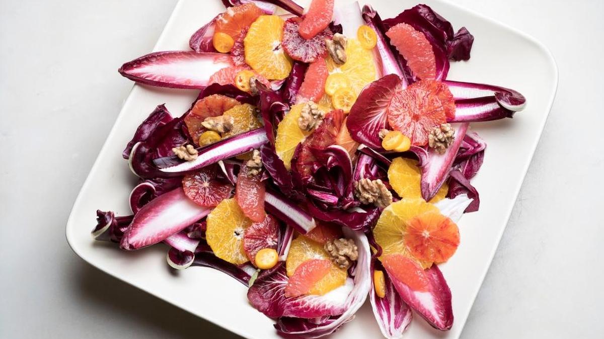 This salad features winter citrus and red chicories such as radicchio. Those red “greens” reach peak harvest at the same time as citrus like blood orange, grapefruit and kumquats, and make for a spectacular pairing of flavors.