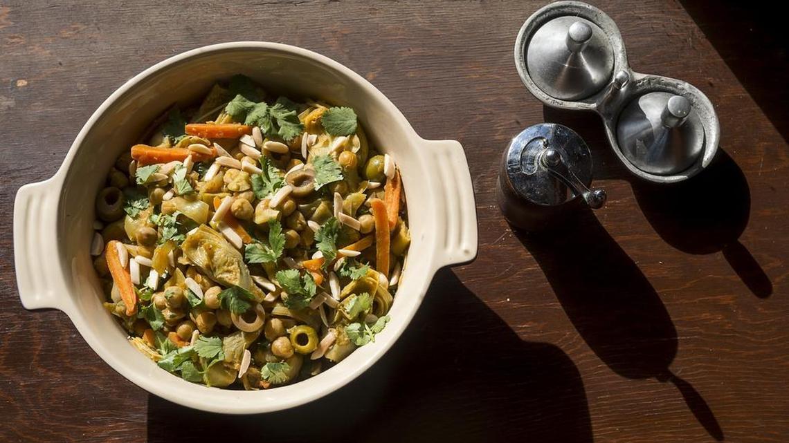 Chickpea and artichoke tagine stew is a quick vegetarian (easily vegan) dish that calls for salt-preserved lemons, a traditional Moroccan flavoring. See recipe, Page 2D.