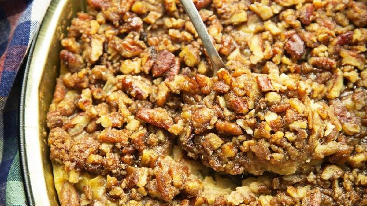 If you don’t like marshmallows, a sweet potato casserole can be topped with breadcrumbs or, as here, with nuts.