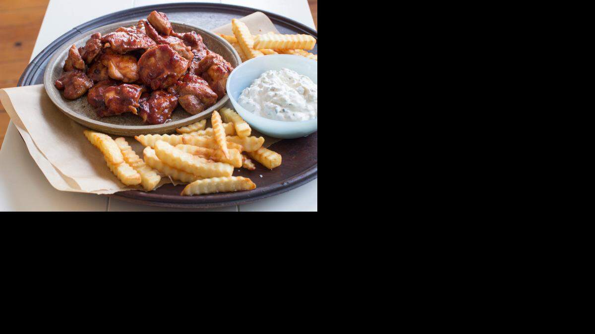 
This Dec. 15, 2014, photo shows easy boneless barbecue bites. Toss the chicken with the sauce, then let it marinate for a day. 
