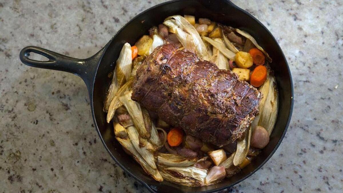 Roasting less popular cuts, such as this eye of round roast with vegetables, results in a flavorful meal for a crowd – and leftovers for sandwiches.