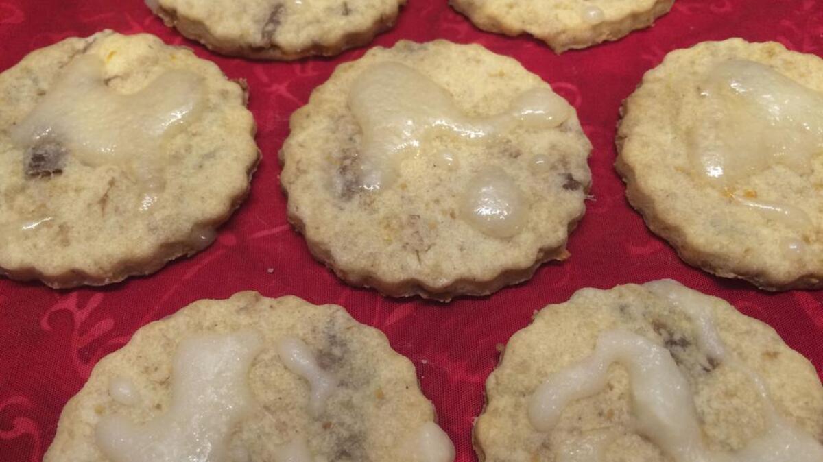 Figgy pudding cookies (see recipe, Page 4D) are buttery treats with holiday flavors. Ingredients include dried figs.