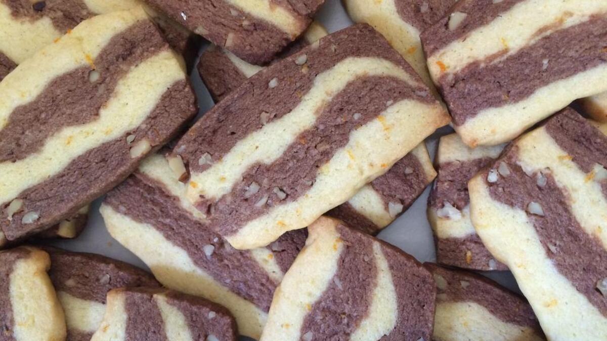 Cardamon, orange and chocolate ribbon cookies are festive and delicious. They go beautifully with a cup of coffee.