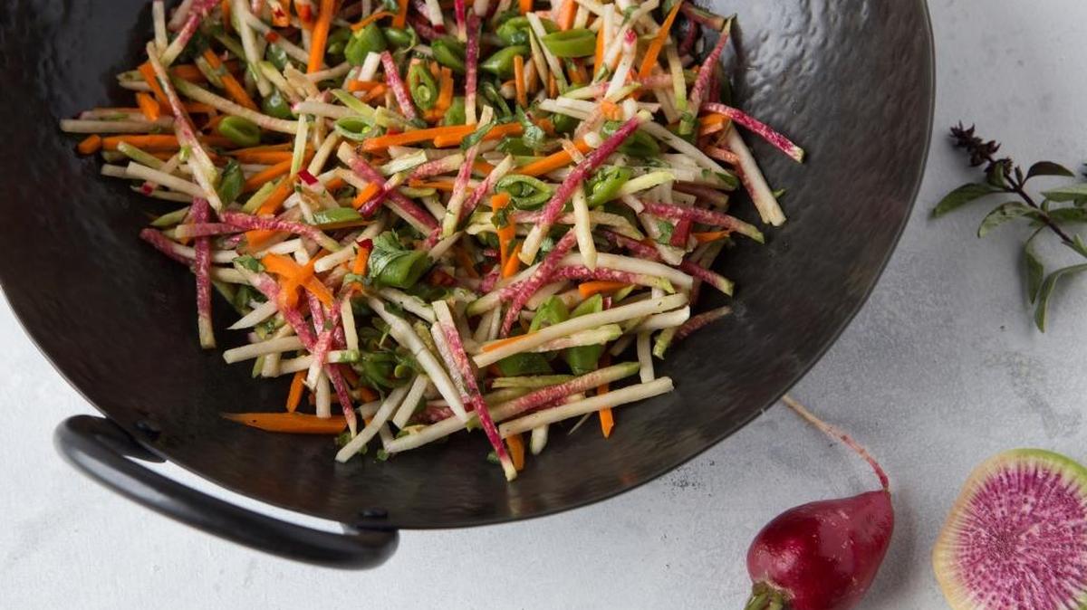 For a burst of color and plenty of crunchiness, try radish and pea slaw.