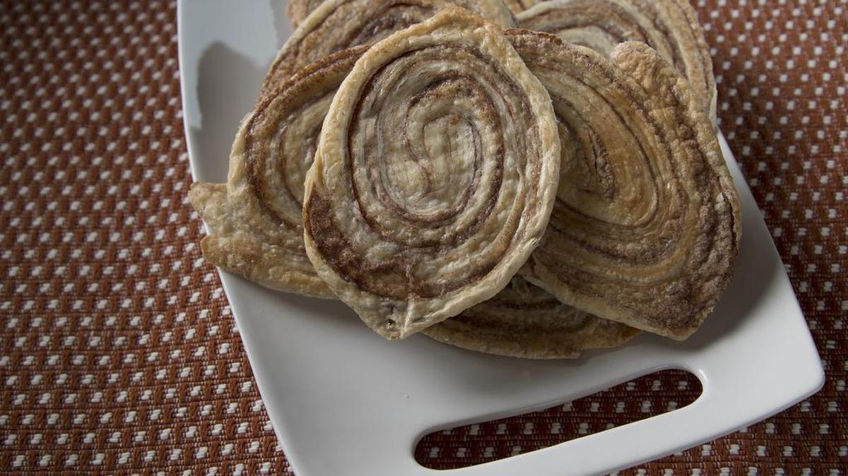 Known as arlettes in Britain or elephant ears in the U.S., they are crisp wafers of sugary, cinnamony pastry.