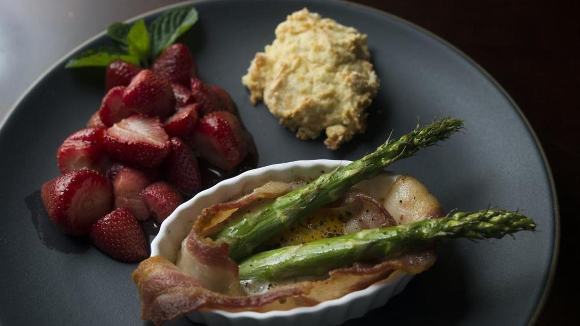 A breakfast menu that kids can help make for Mother's Day includes a bacon, egg and asparagus cup, drop biscuits and roasted strawberries.