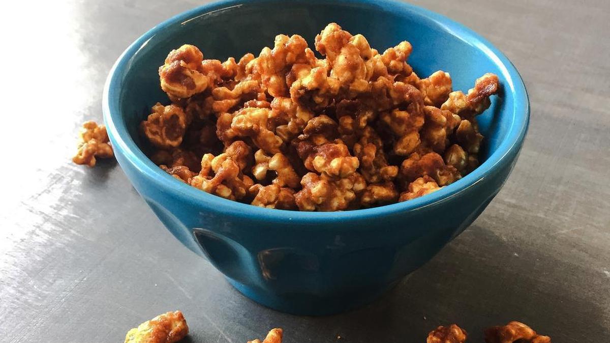 Dorie Greenspan’s caramel-honey popcorn can be spiced up with chipotle and cinnamon.