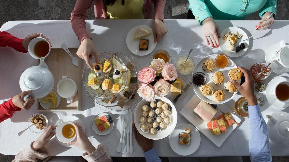 Bite-size sandwiches, snacks and desserts are made for sharing at an afternoon tea. Writer Becky Krystal has some tips on how to throw your own.