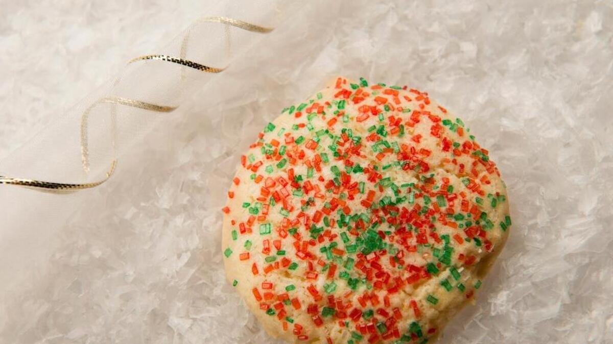 Stir-and-drop sugar cookies are made with flour, sugar, canola oil (that’s flexible) and eggs, then topped with colored sugar.