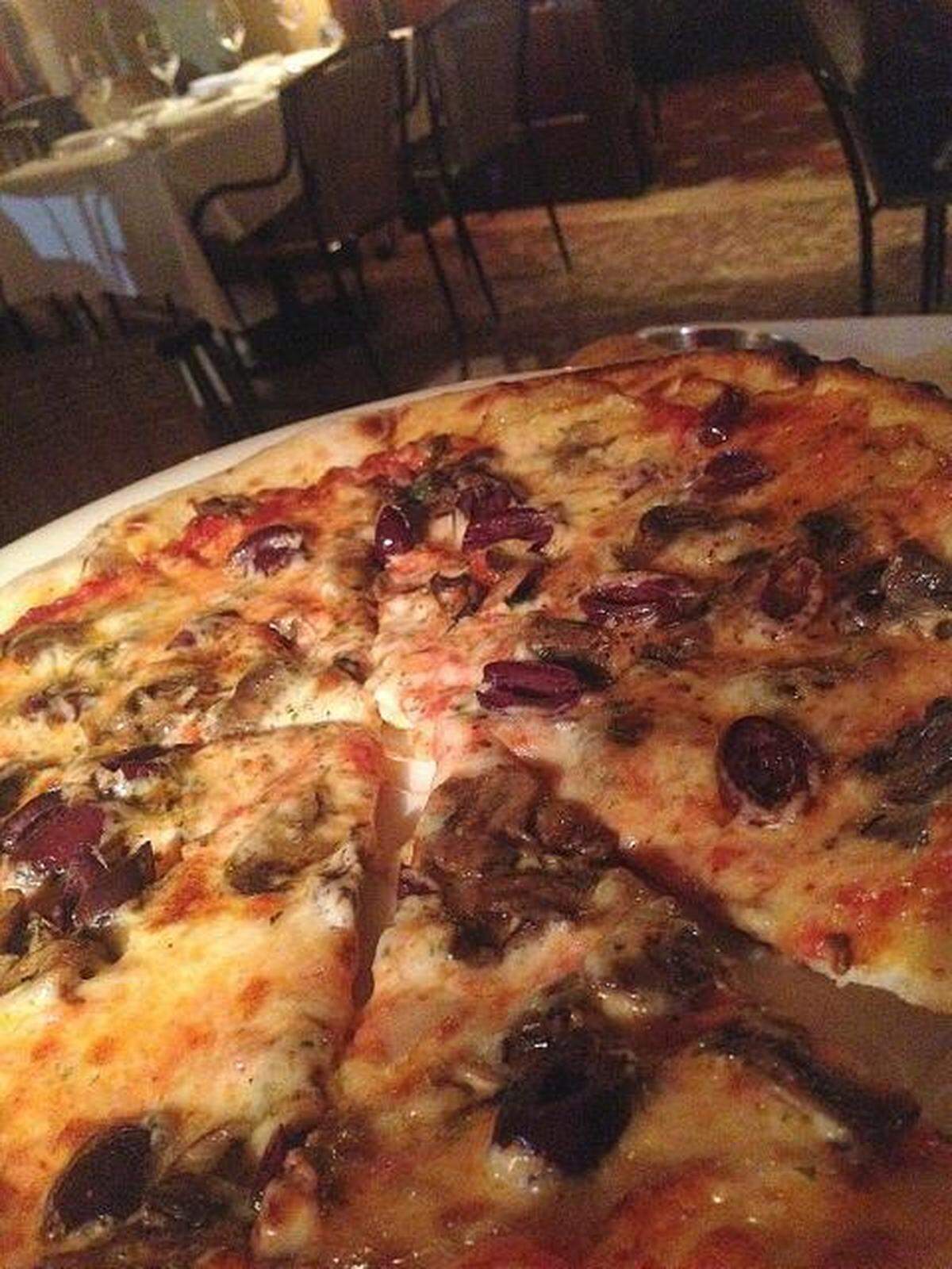 A margherita pizza with add-ons of kalamata olives and mushrooms at Il Fornaio. The restaurant reservation website, OpenTable, has released a list of dinner spots with tables available on Sunday, May 10.