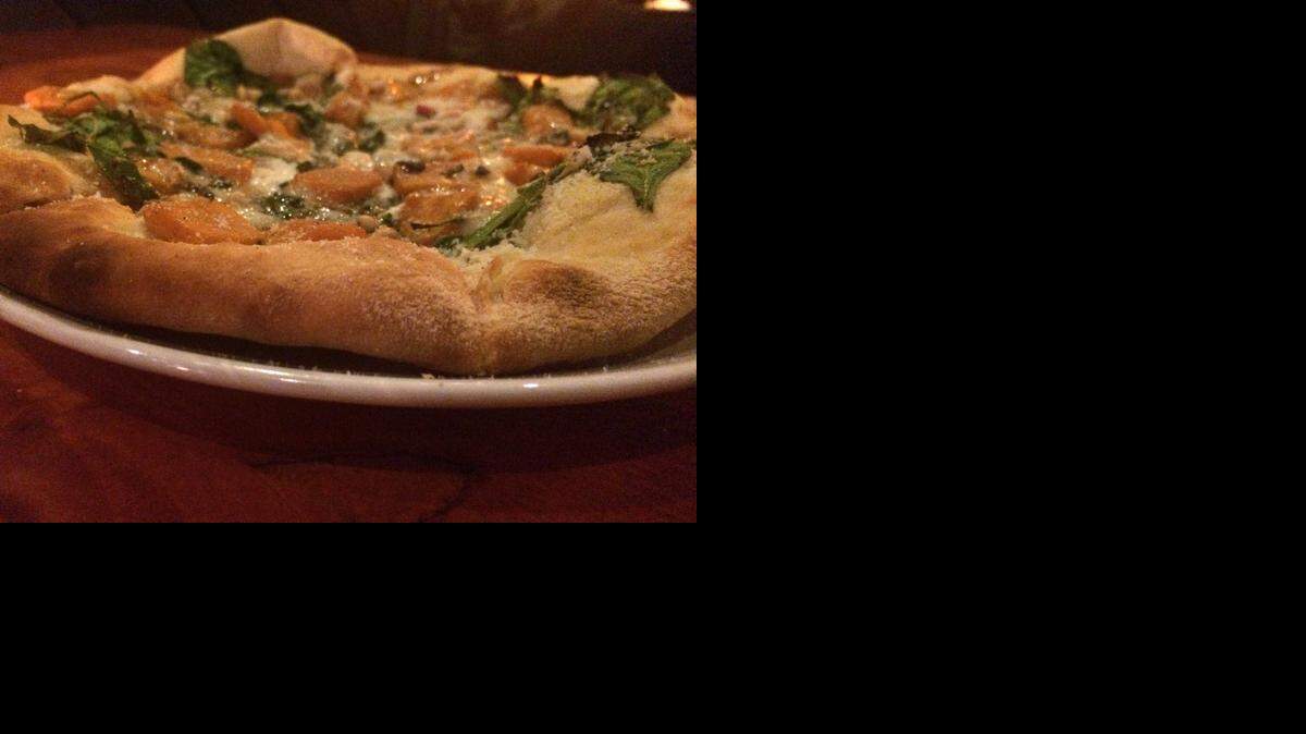 
The crust of the Catalan-style flatbread pizza served at Lola’s Lounge in Elk Grove is much lighter than Neapolitan-style pies.
