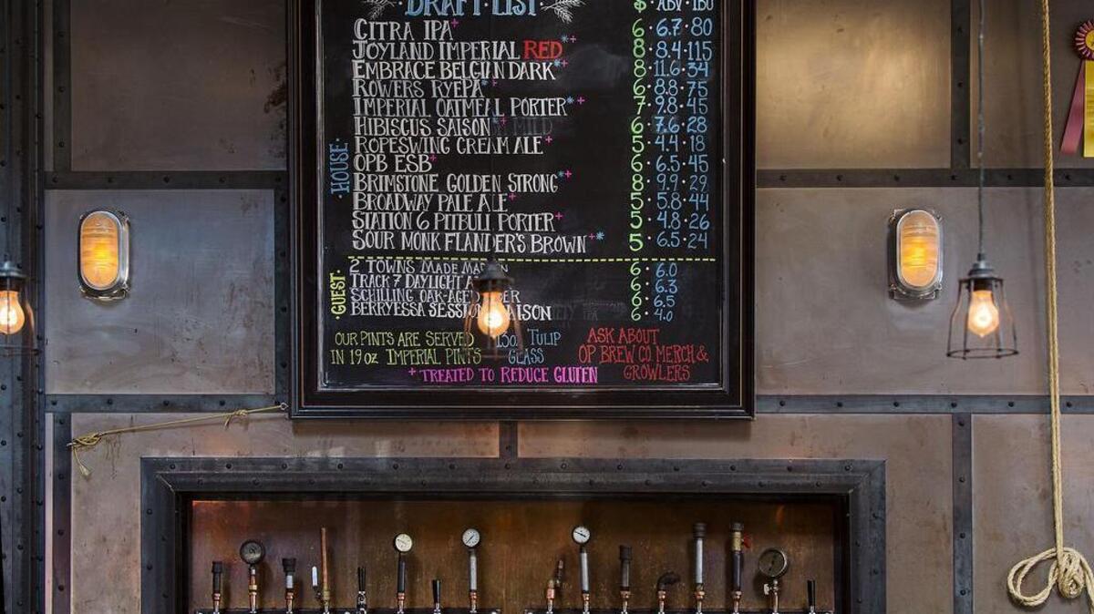 
The draft beer list behind the bar at Oak Park Brewing Co.
