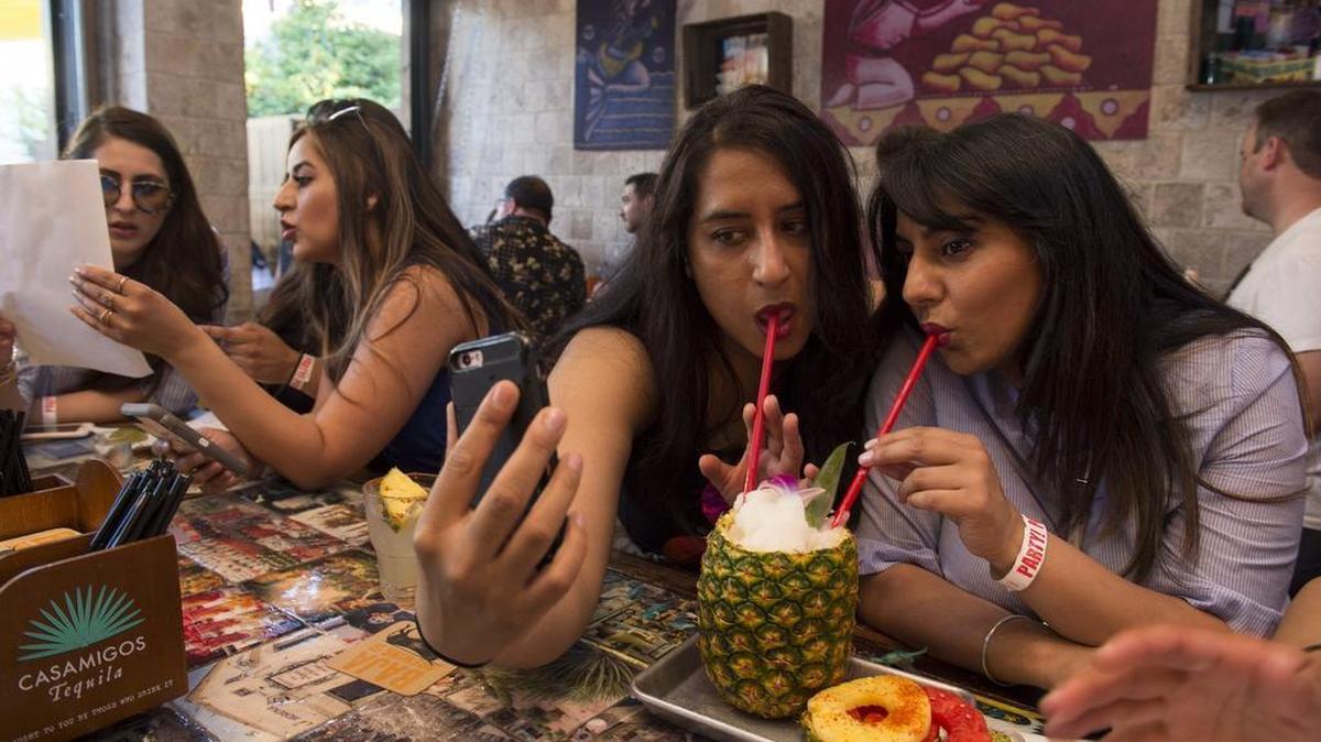 Nina Gill and her cousin Manjit Gill share a cocktail at Midtown’s Cantina Alley in 2017. Owners Art Aguilar and Max Archuleta are developing a new restaurant concept in Folsom’s Historic District.