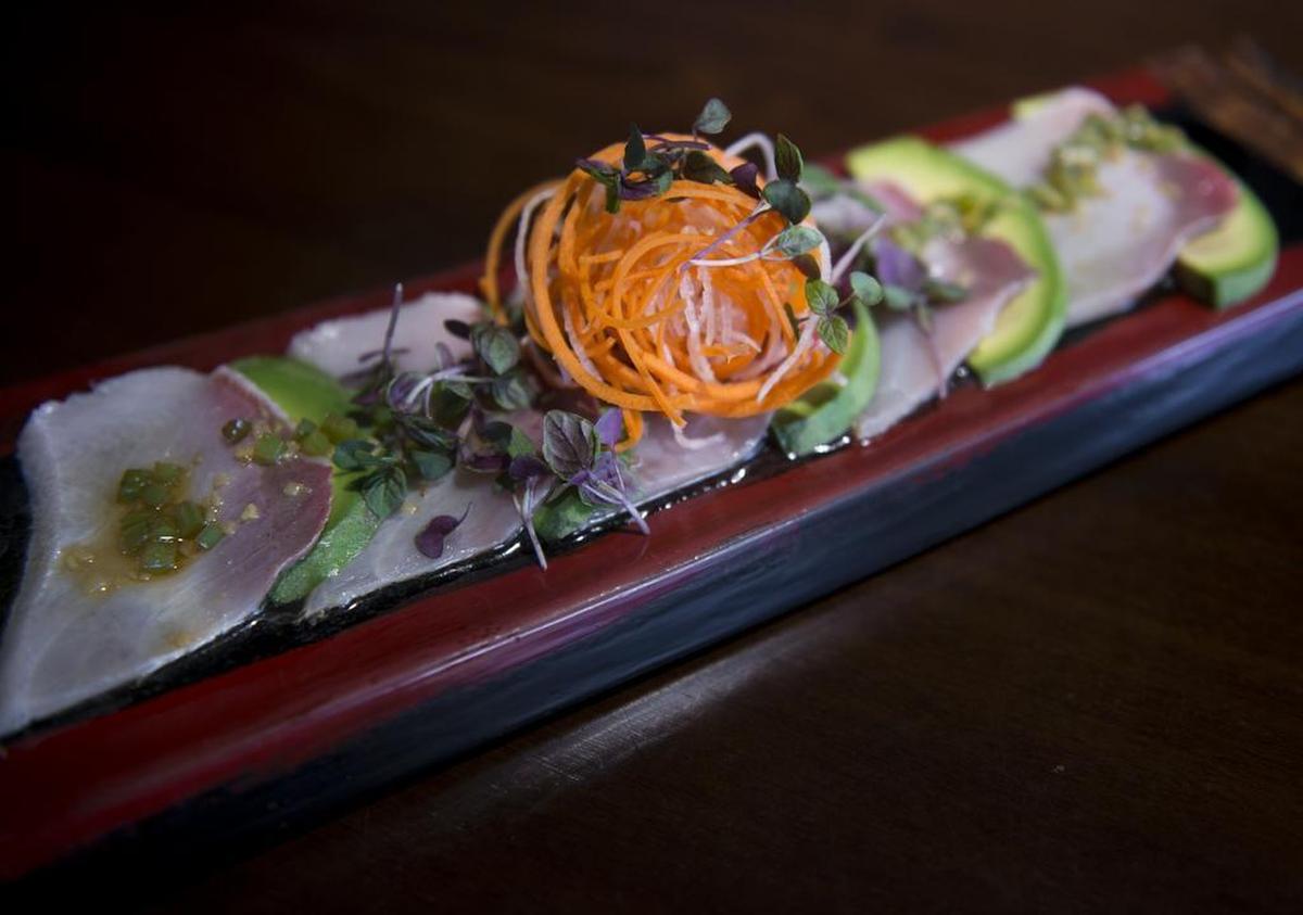 Binchoyaki’s hamachi carpaccio has creamy avocado and tangy ponzu sauce.