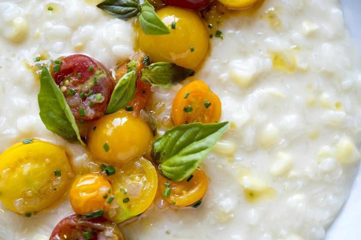 Brentwood corn risotto with Pierce family farm cherry tomatoes, Parmesan and basil at Hawks restaurant in Granite Bay.