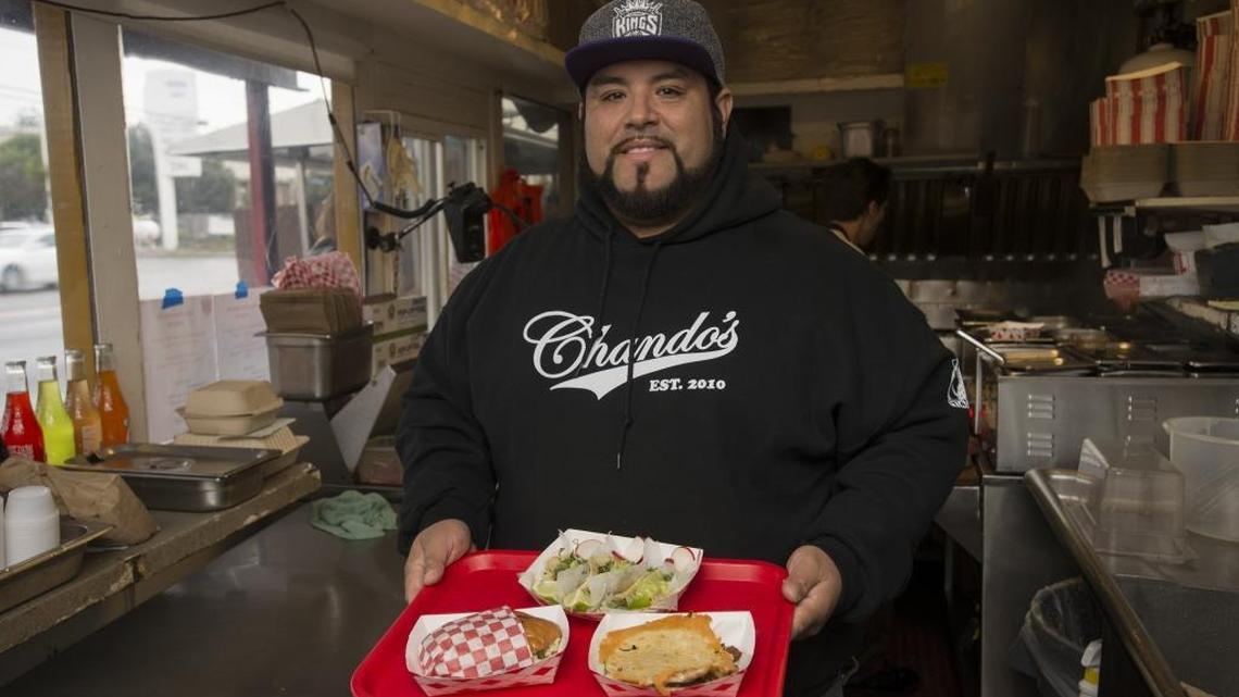 Lisandro “Chando” Madrigal operates three taco outlets in the area.