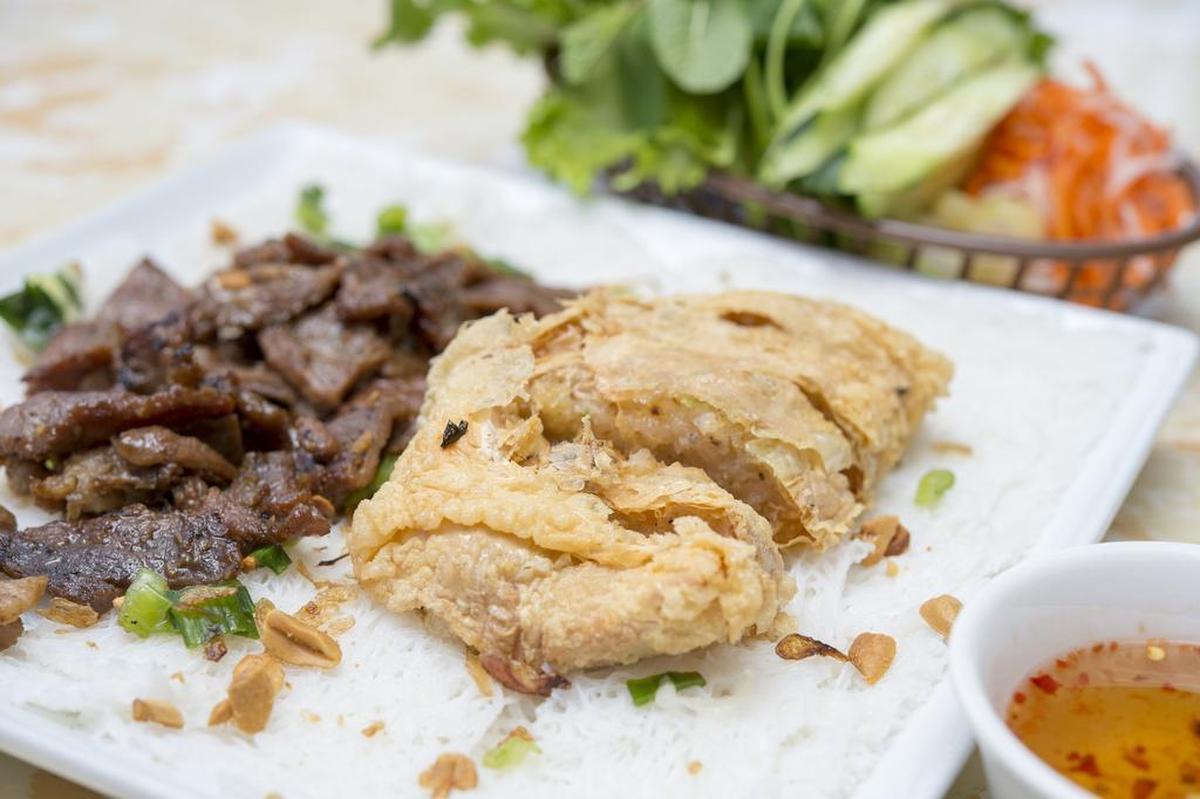Tiny rice vermicelli with BBQ pork and fried shrimp cake with fresh vegetables.