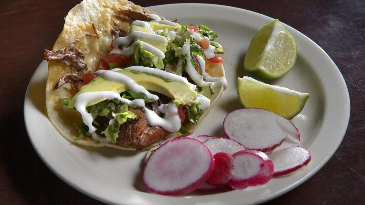Crispy taco con biria at Taqueria Maya. The owners are planning another restaurant.