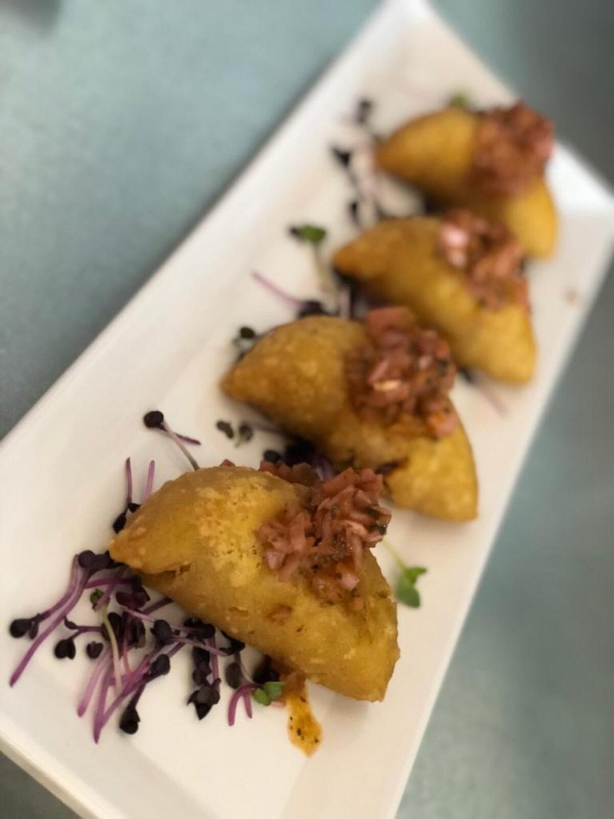 Pork empanadas at Serpentine Fox Prohibition Grille.