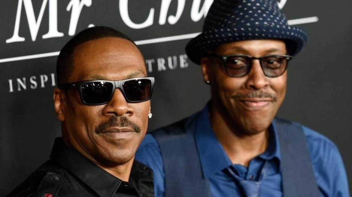 Eddie Murphy, left, and Arsenio Hall arrive for the premiere of “Mr. Church” last year in Los Angeles. The two men starred together in the 1988 film “Coming to America.” Reports say a sequel is in the works.