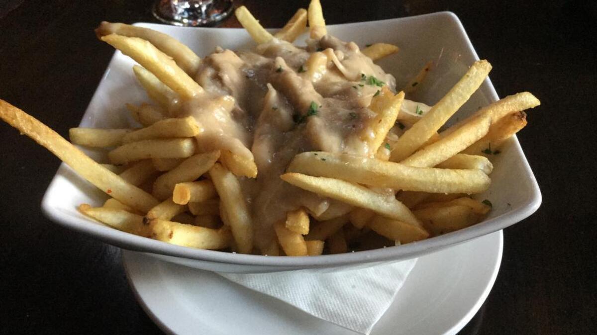 
Oak Park Brewing Company’s Irish fries come with rabbit gravy. 
