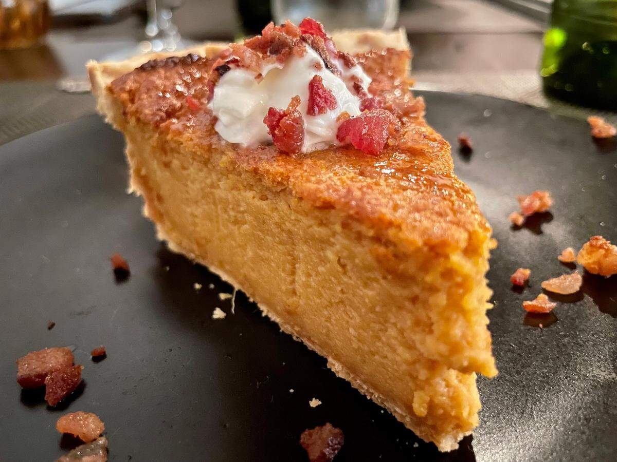 Fourk Kitchen’s November 2024 menu concluded with sweet potato pie topped with bacon and maple syrup-infused whipped cream.