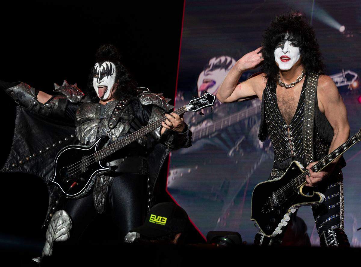Kiss original band members Gene Simmons, left, and Paul Stanley play to the audience at the Aftershock Festival on Friday, Oct. 7, 2022 at Discovery Park in Sacramento.