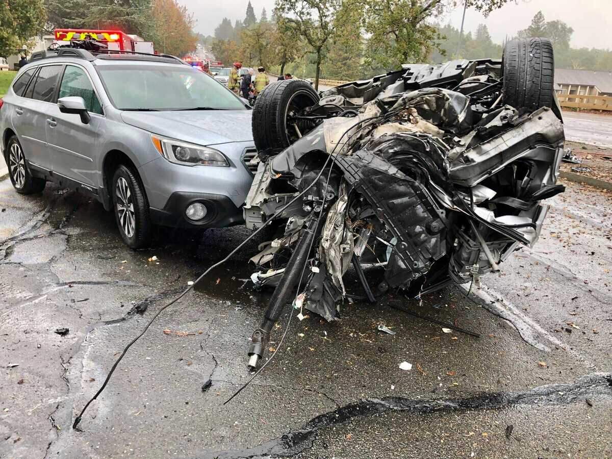 A gray Infinity coupe struck a tree and was torn in half before hitting a Subaru in the oncoming lane Tuesday Nov. 9, 2021, on Madison Avenue in Orangevale, California.