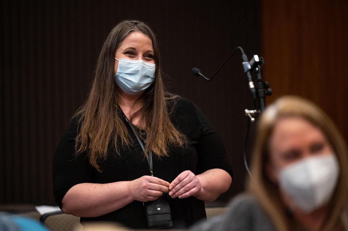 Shanie Phillips looks towards Judge Lawrence Brown after caseworkers and colleagues on a video call express their support for her as she graduates from Mental Health Court on Tuesday, Jan. 25, 2022, in Sacramento Superior Court.