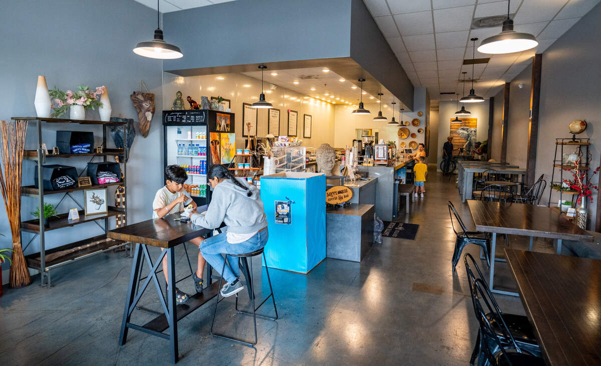 Customers eat and drink at Savvy House Coffee Bar in Elk Grove on Aug. 17, 2022.
